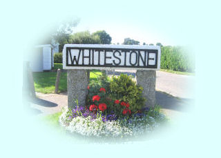 Sign entering Whitestone village
